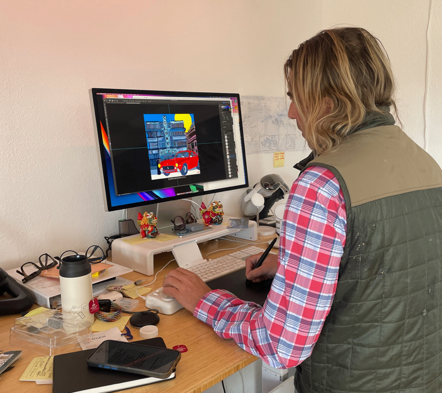 Topher Straus working on a painting in his Colorado studio